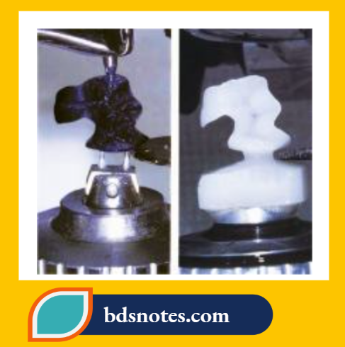 Close-up of copying and milling process showing the wax pattern and the milled inlay