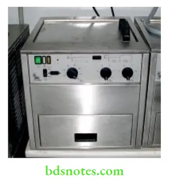 Denture Resins And Polymers An automated curing bath (Kavo). The time and temperature of the curing cycle can be preset and regulated for optimum cure.
