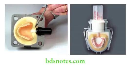 Denture Resins And Polymers Injection molded denture resin technique. The picture shows the dentures invested in a special flask.